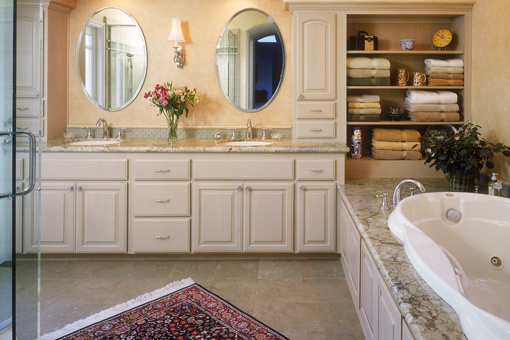 Traditional Style Bathroom Cabinets White Wash Finish Double Sinks Upper Towers Open Linen Shelving on Tub