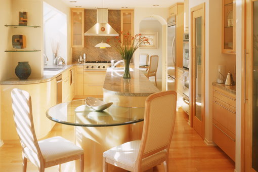 Contemporary Kitchen Cabinets in Maple with Radius End Lower Island Seating