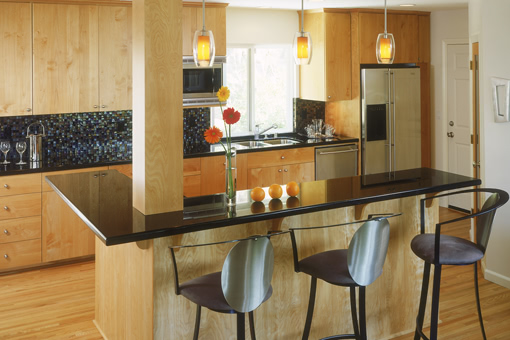 Contemporary Kitchen Cabinets with Red Birch and Bookmatched Doors